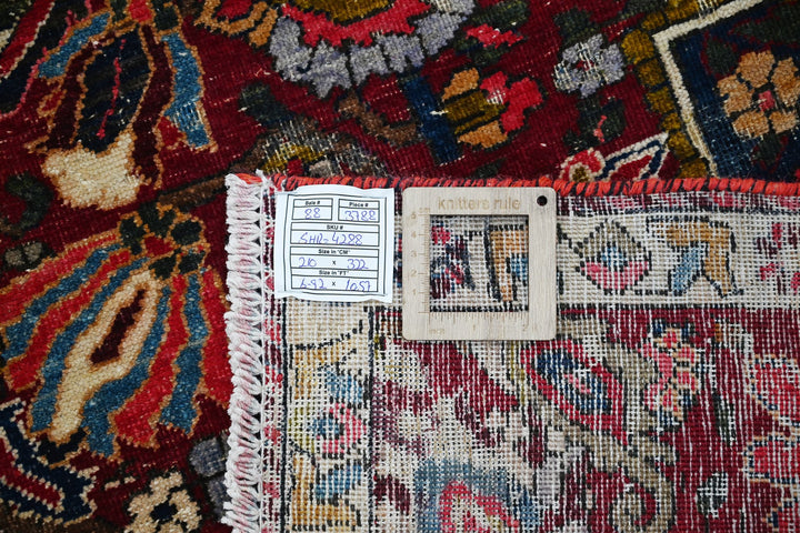 red Large rug 6' 11" x 10' 7"