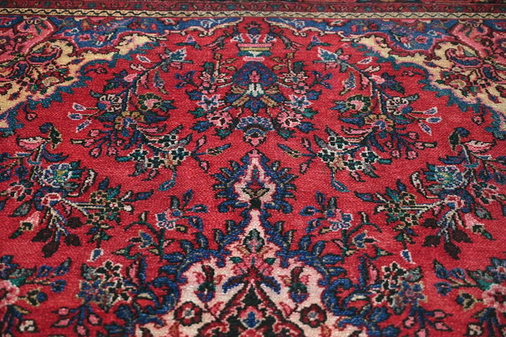 red Large rug 6' 7" x 9' 10"