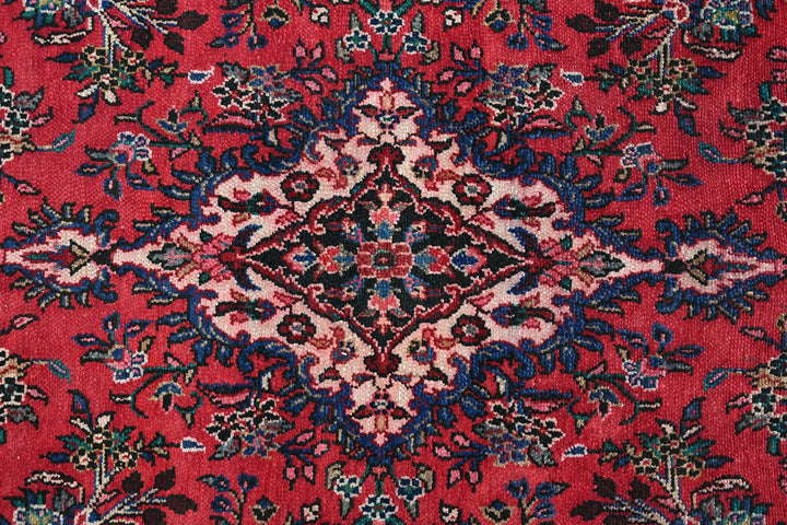red Large rug 6' 7" x 9' 10"