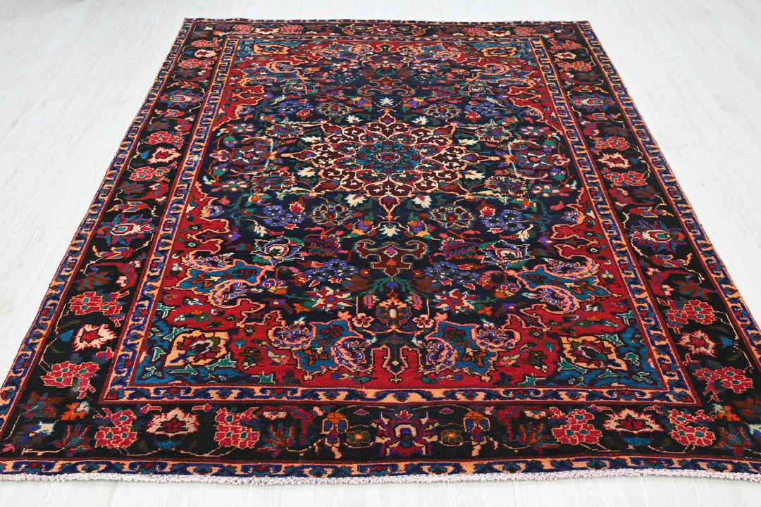 blue Large rug 6' 11" x 9' 0"