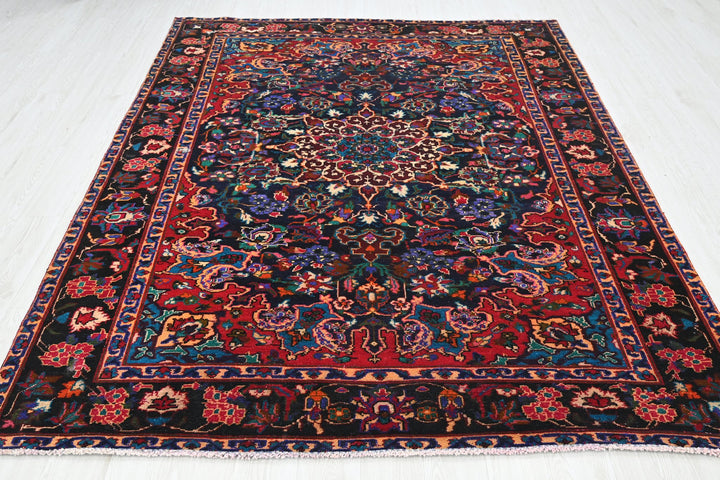 blue Large rug 6' 11" x 9' 0"