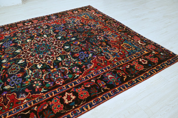 blue Large rug 6' 11" x 9' 0"