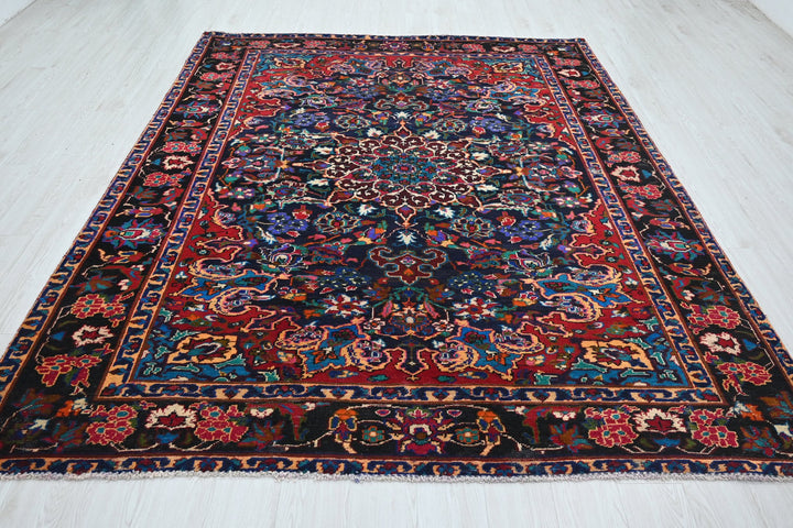 blue Large rug 6' 11" x 9' 0"