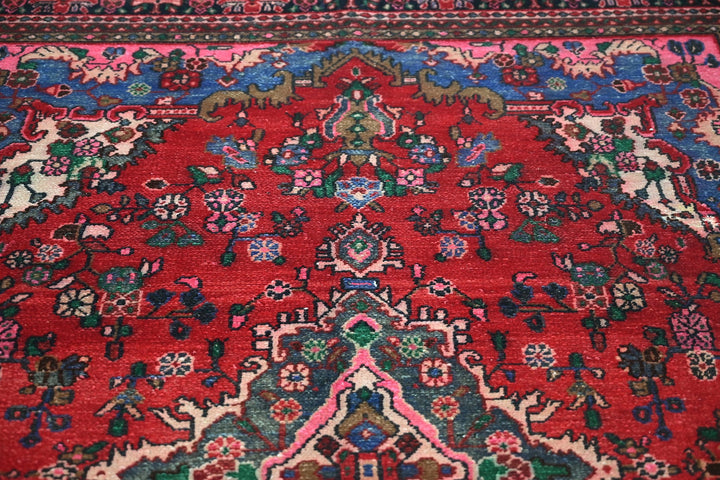 red Large rug 6' 7" x 9' 5"