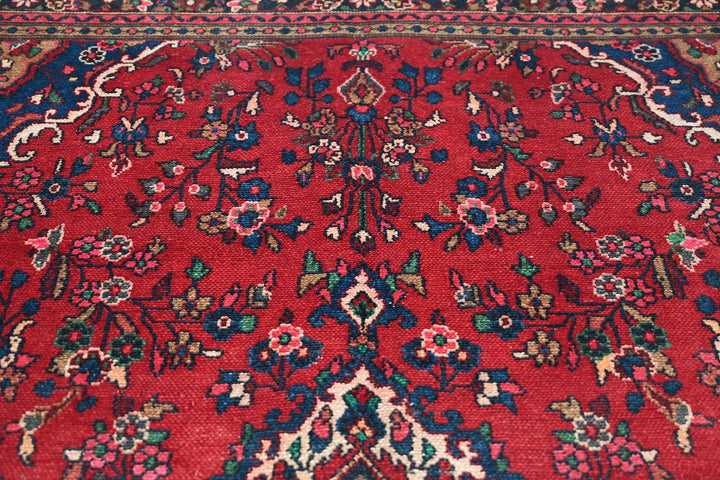 red Large rug 6' 9" x 9' 7"