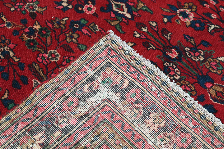 red Large rug 6' 9" x 9' 7"