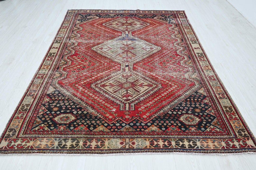 red Medium rug 6' 2" x 8' 10"