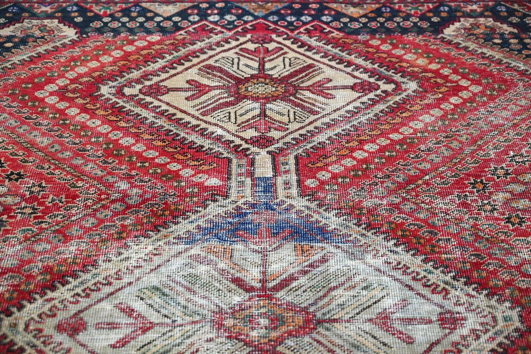red Medium rug 6' 2" x 8' 10"