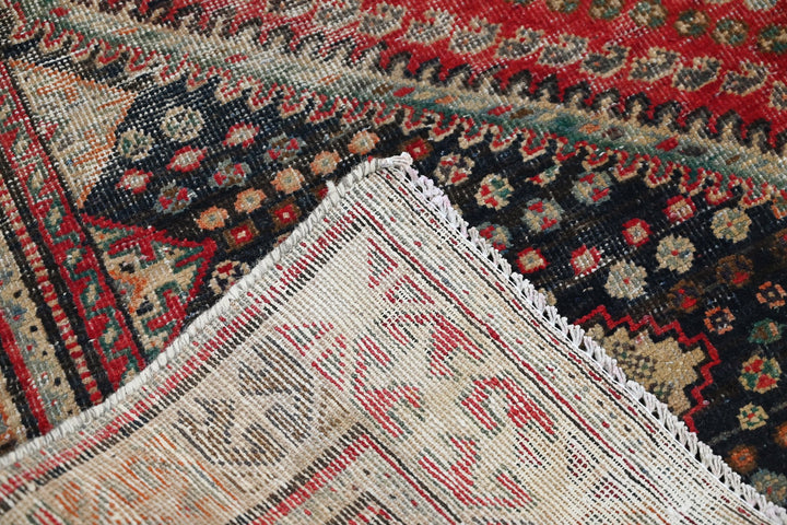 red Medium rug 6' 2" x 8' 10"
