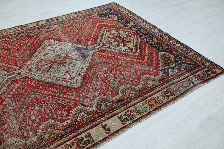 red Medium rug 6' 2" x 8' 10"