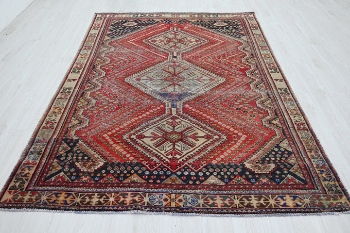red Medium rug 6' 2" x 8' 10"