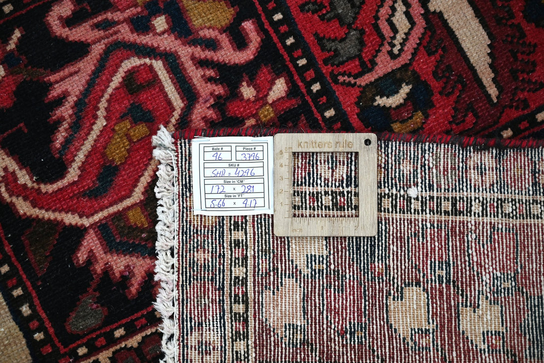 red Medium rug 5' 8" x 9' 3"