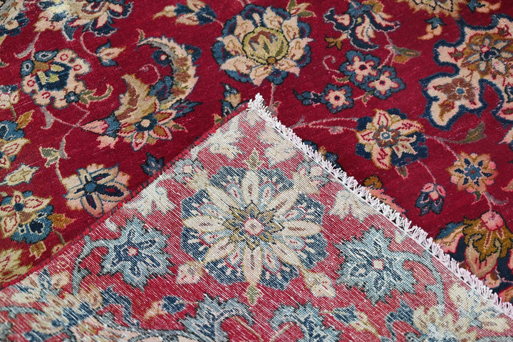 red Large rug 6' 9" x 9' 9"