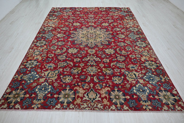 red Large rug 6' 9" x 9' 9"