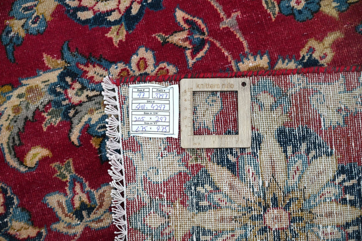 red Large rug 6' 9" x 9' 9"