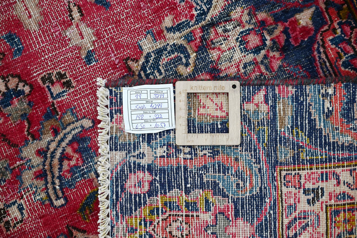 red Large rug 6' 6" x 10' 7"