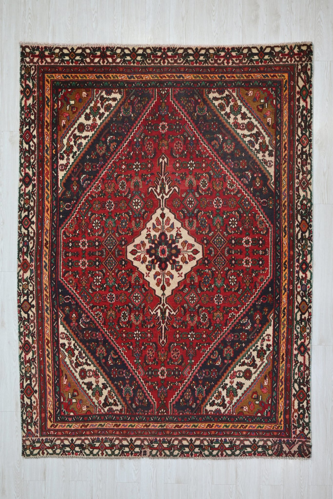 red Medium rug 6' 2" x 8' 8"