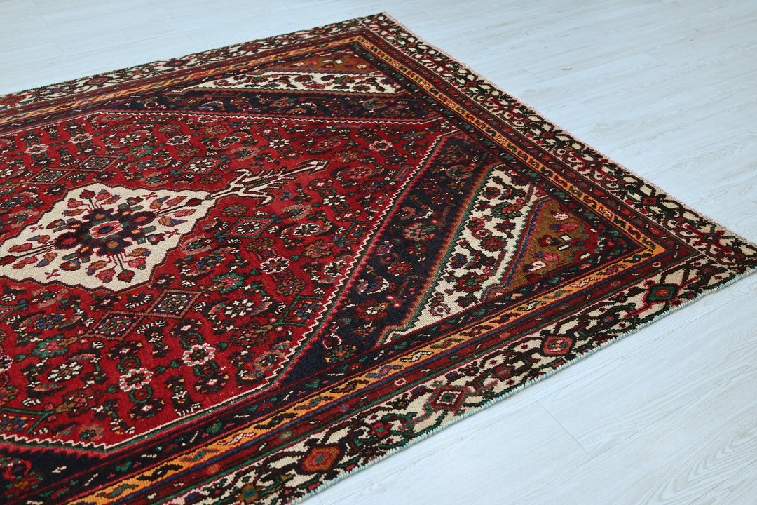 red Medium rug 6' 2" x 8' 8"