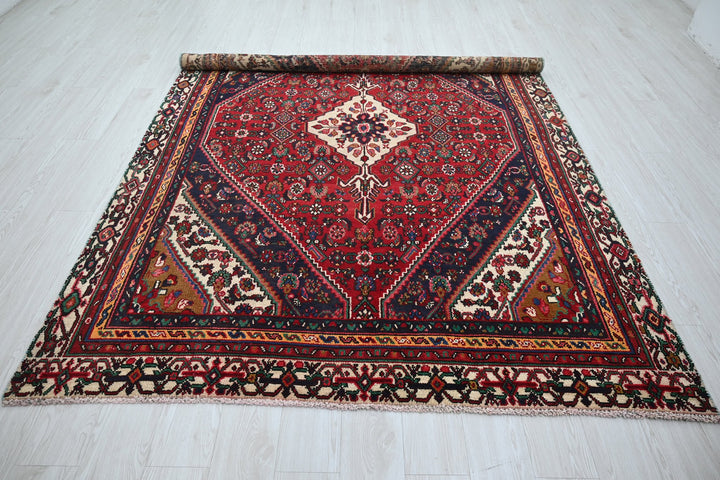 red Medium rug 6' 2" x 8' 8"