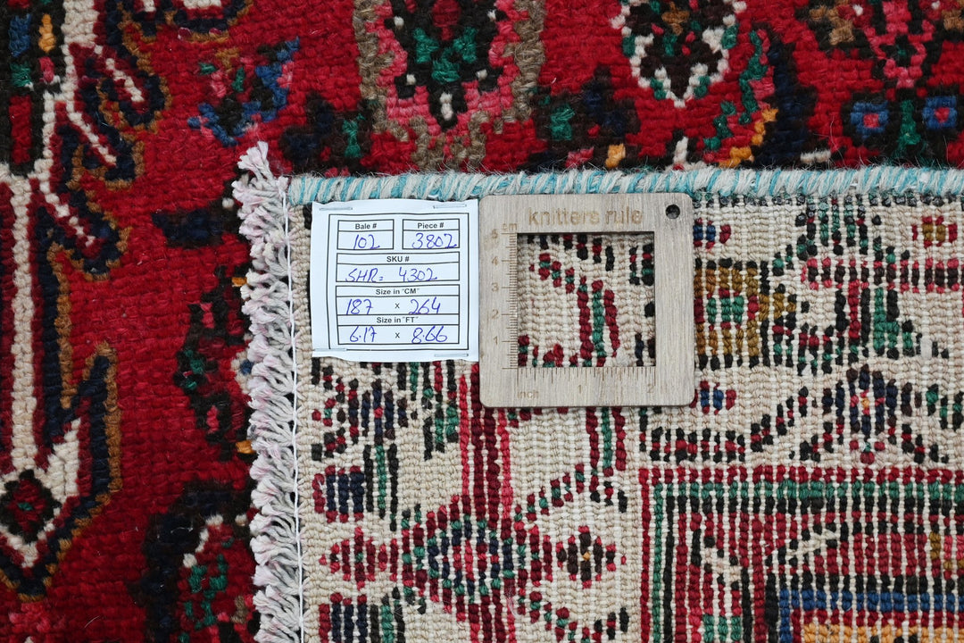 red Medium rug 6' 2" x 8' 8"