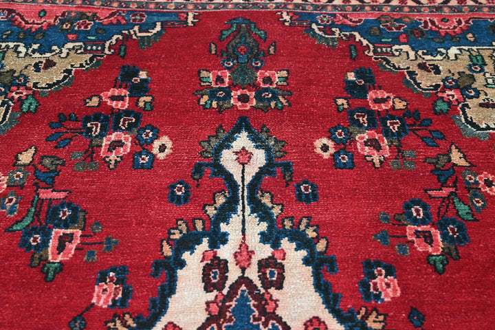 red Large rug 6' 11" x 9' 4"