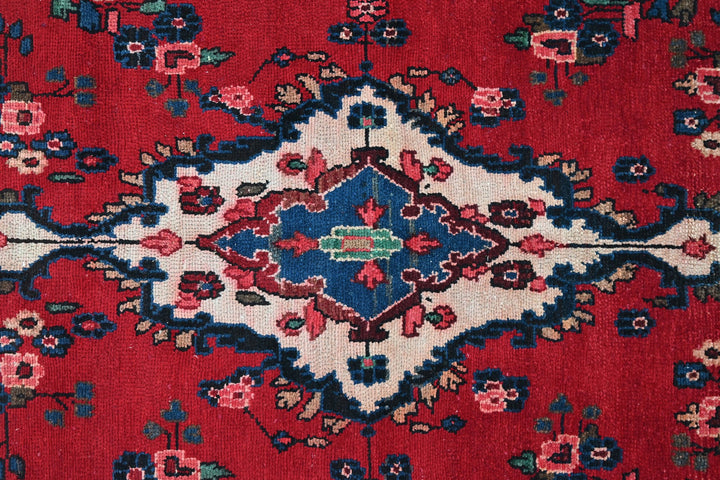 red Large rug 6' 11" x 9' 4"