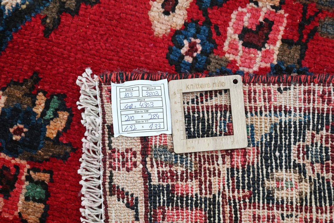 red Large rug 6' 11" x 9' 4"