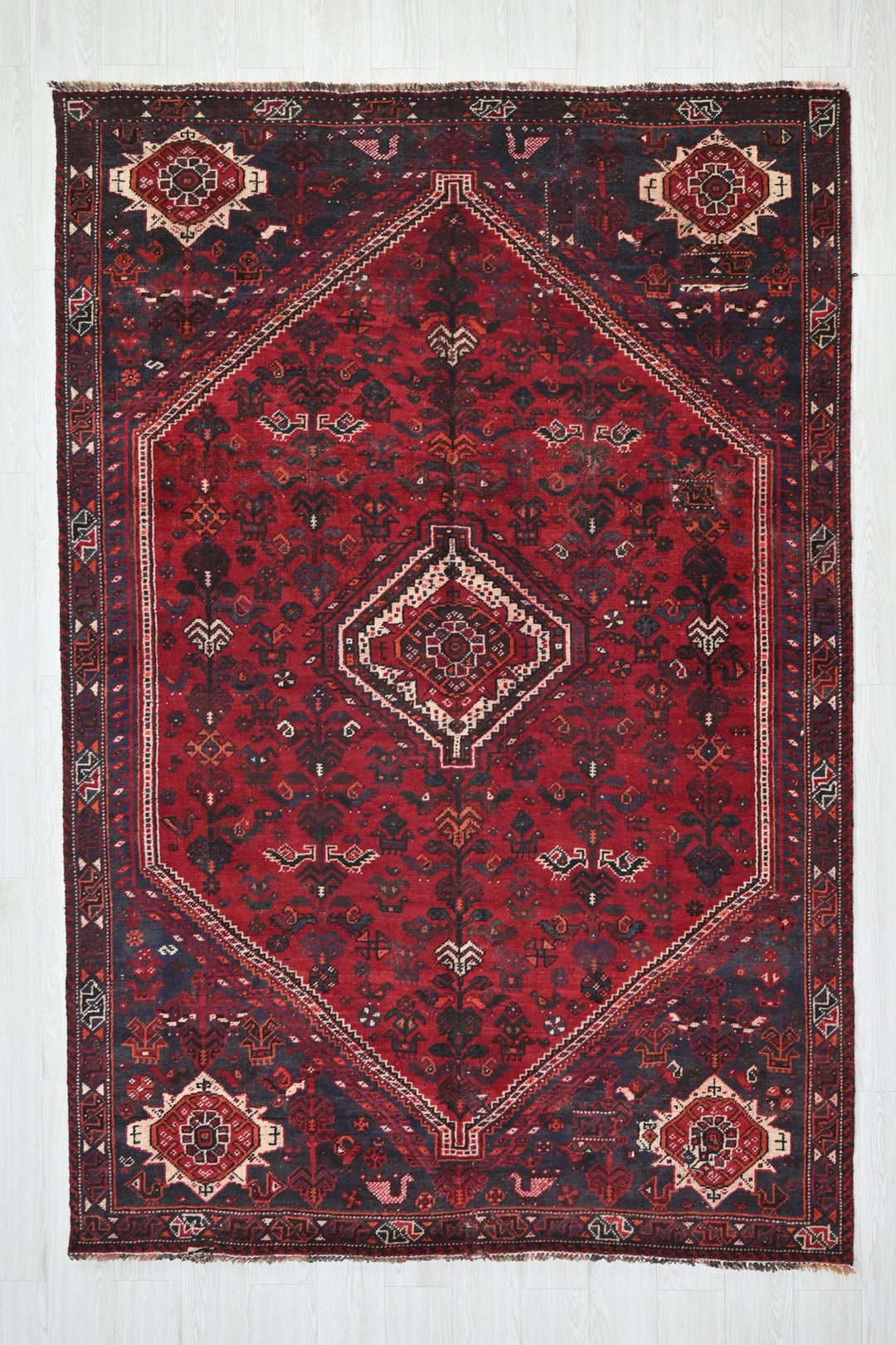 red Medium rug 5' 9" x 8' 6"