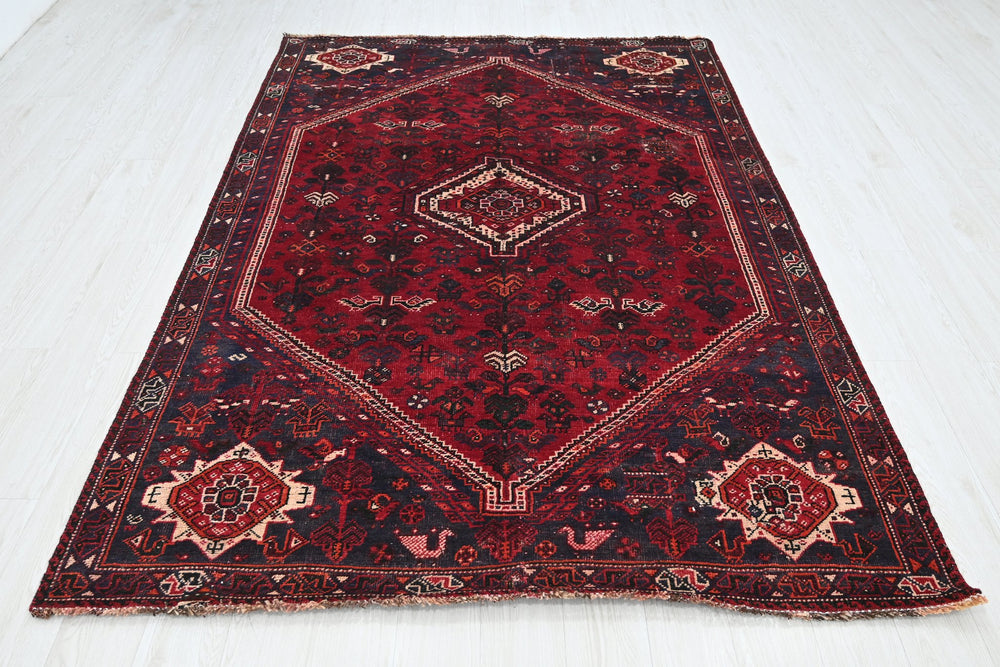 red Medium rug 5' 9" x 8' 6"