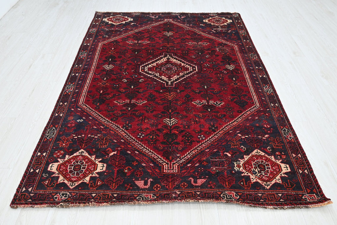red Medium rug 5' 9" x 8' 6"
