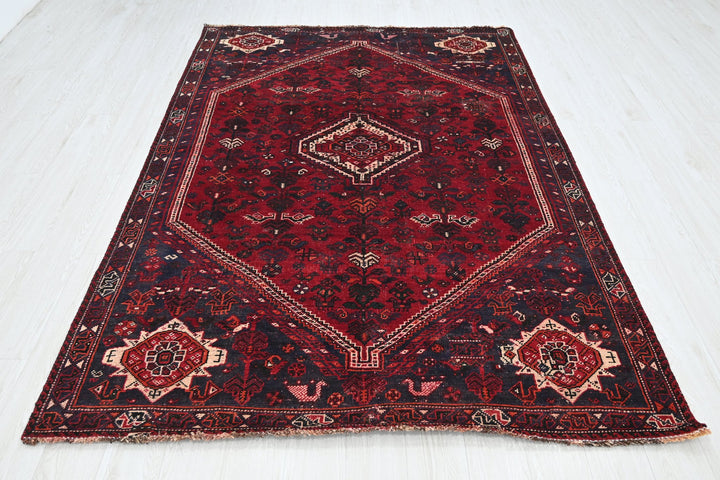 red Medium rug 5' 9" x 8' 6"