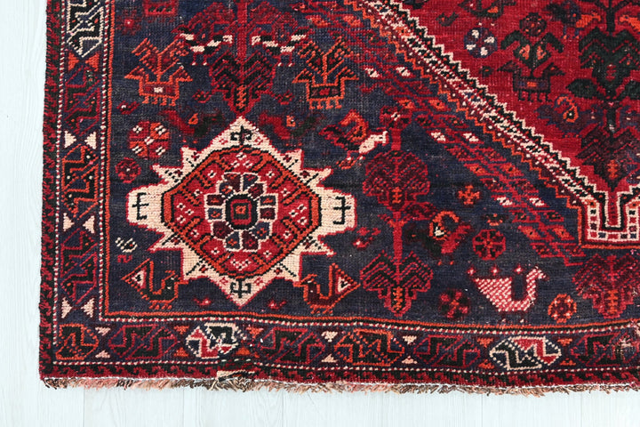 red Medium rug 5' 9" x 8' 6"