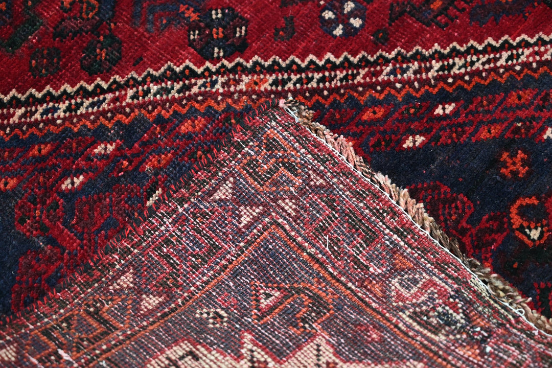 red Medium rug 5' 9" x 8' 6"