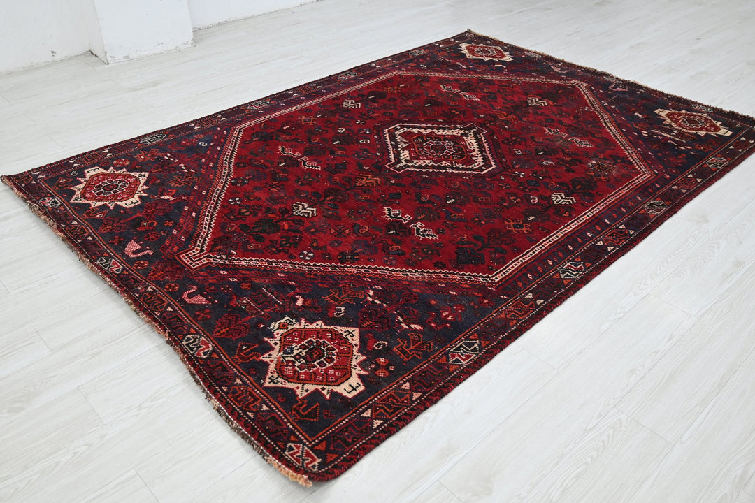 red Medium rug 5' 9" x 8' 6"