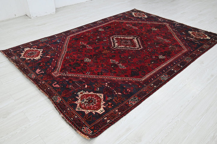 red Medium rug 5' 9" x 8' 6"