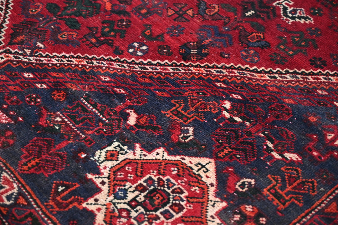 red Medium rug 5' 9" x 8' 6"
