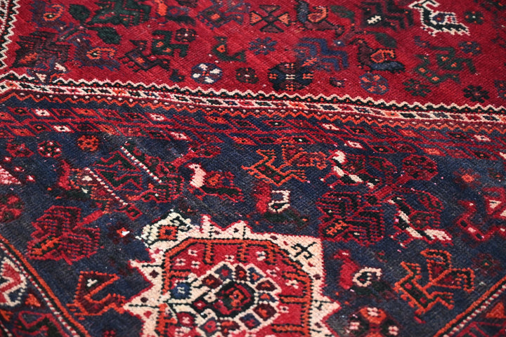 red Medium rug 5' 9" x 8' 6"