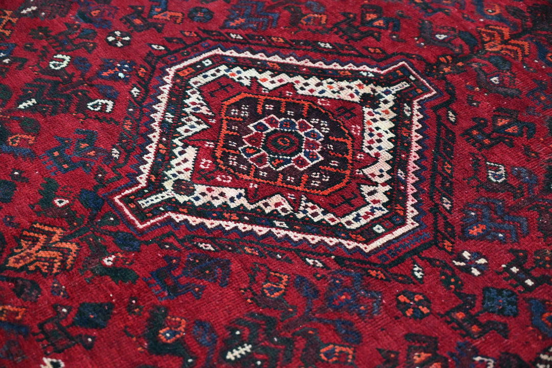 red Medium rug 5' 9" x 8' 6"
