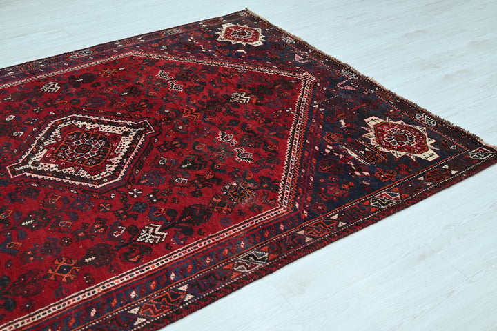 red Medium rug 5' 9" x 8' 6"