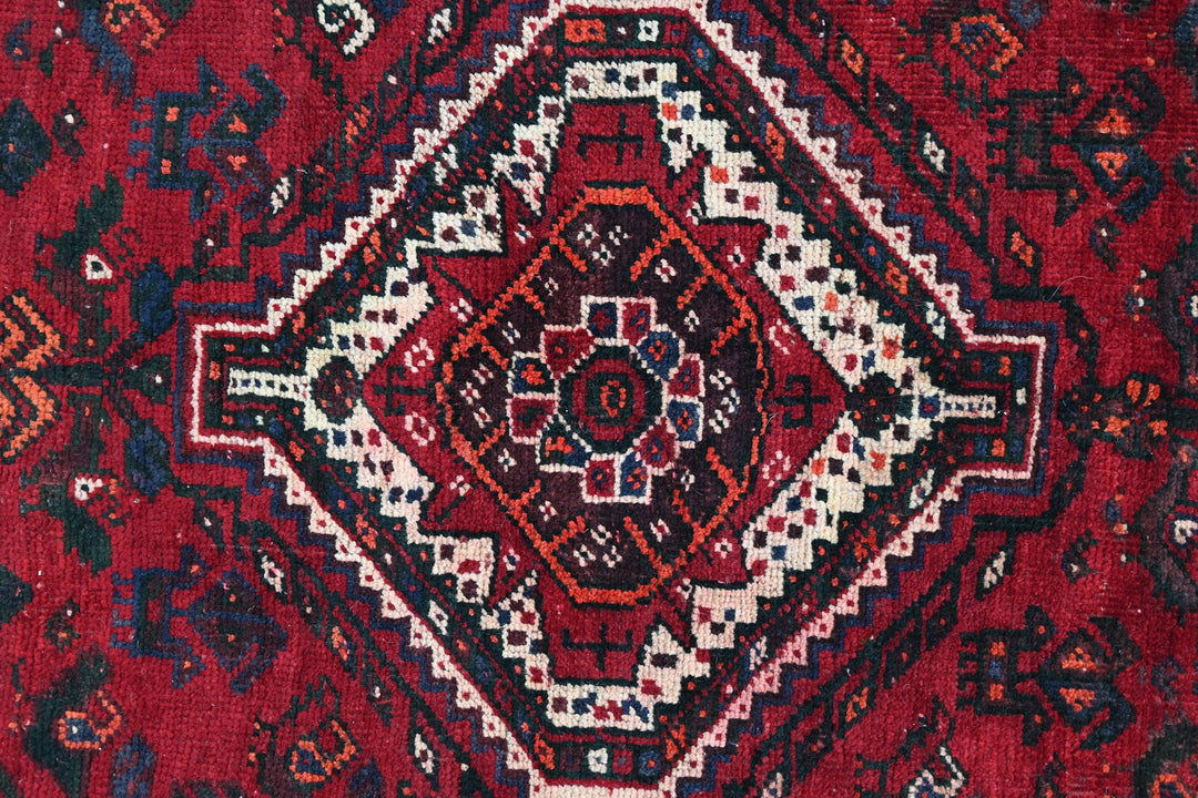 red Medium rug 5' 9" x 8' 6"