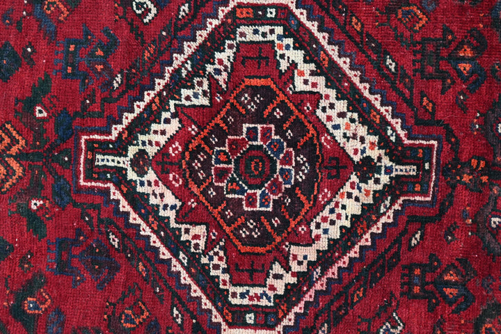 red Medium rug 5' 9" x 8' 6"