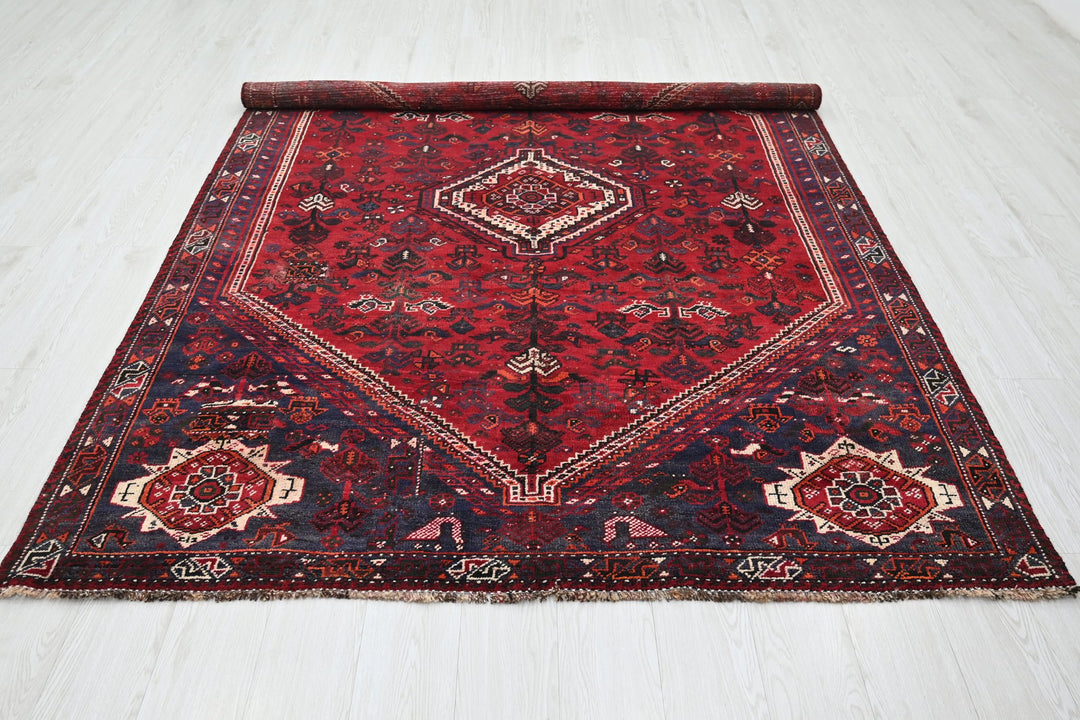 red Medium rug 5' 9" x 8' 6"