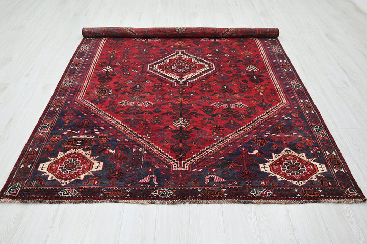 red Medium rug 5' 9" x 8' 6"