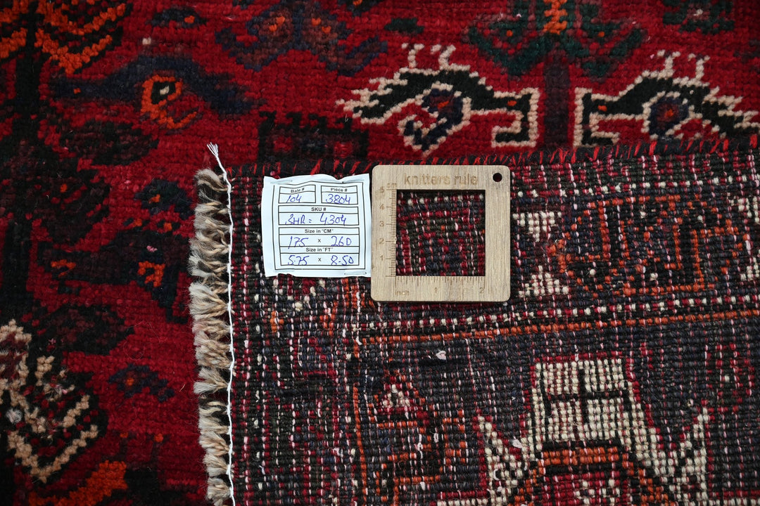 red Medium rug 5' 9" x 8' 6"