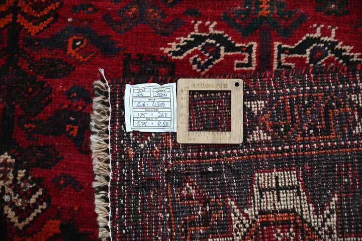 red Medium rug 5' 9" x 8' 6"