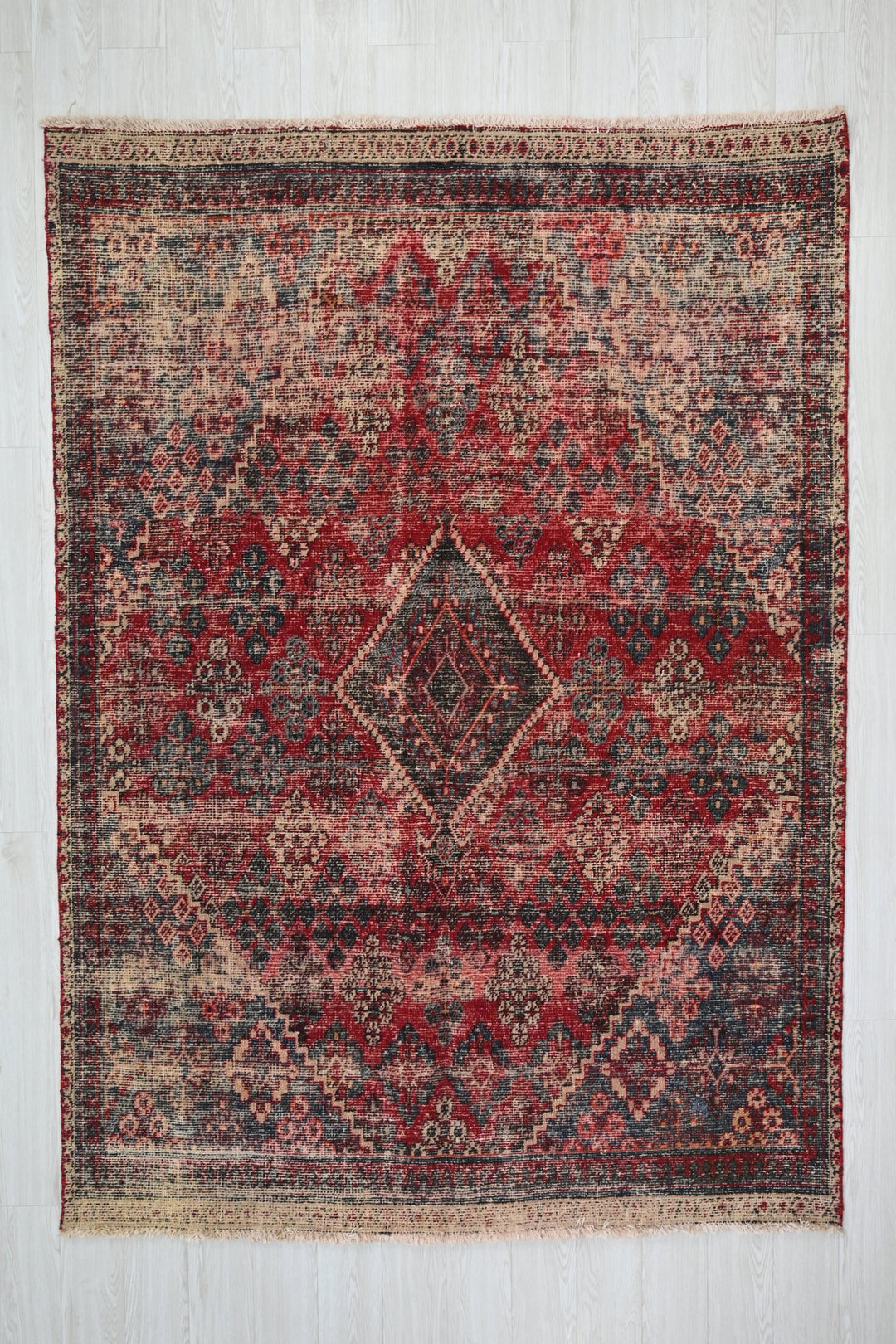 red Medium rug 5' 11" x 8' 6"