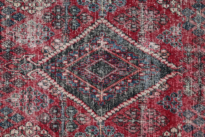 red Medium rug 5' 11" x 8' 6"