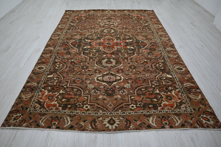 brown Large rug 6' 6" x 9' 6"
