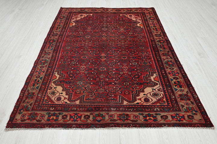 red Medium rug 5' 4" x 7' 8"