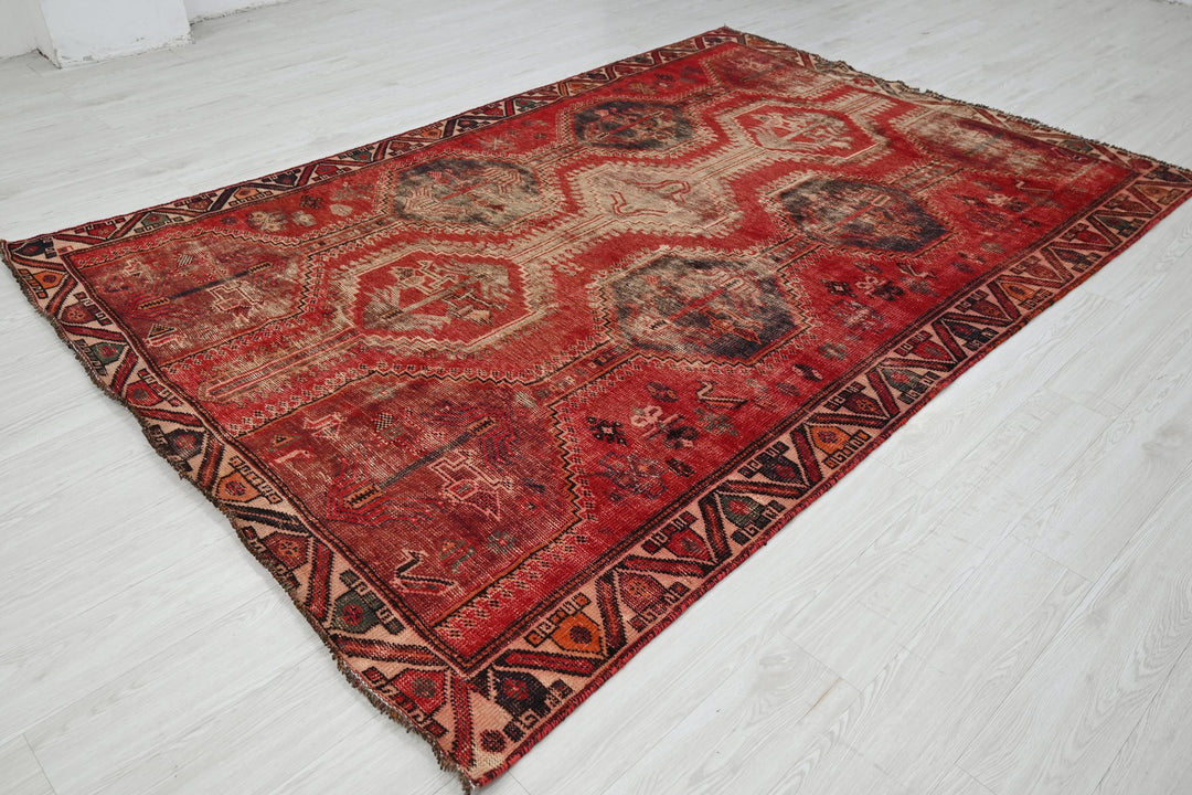 red Medium rug 6' 0" x 9' 2"